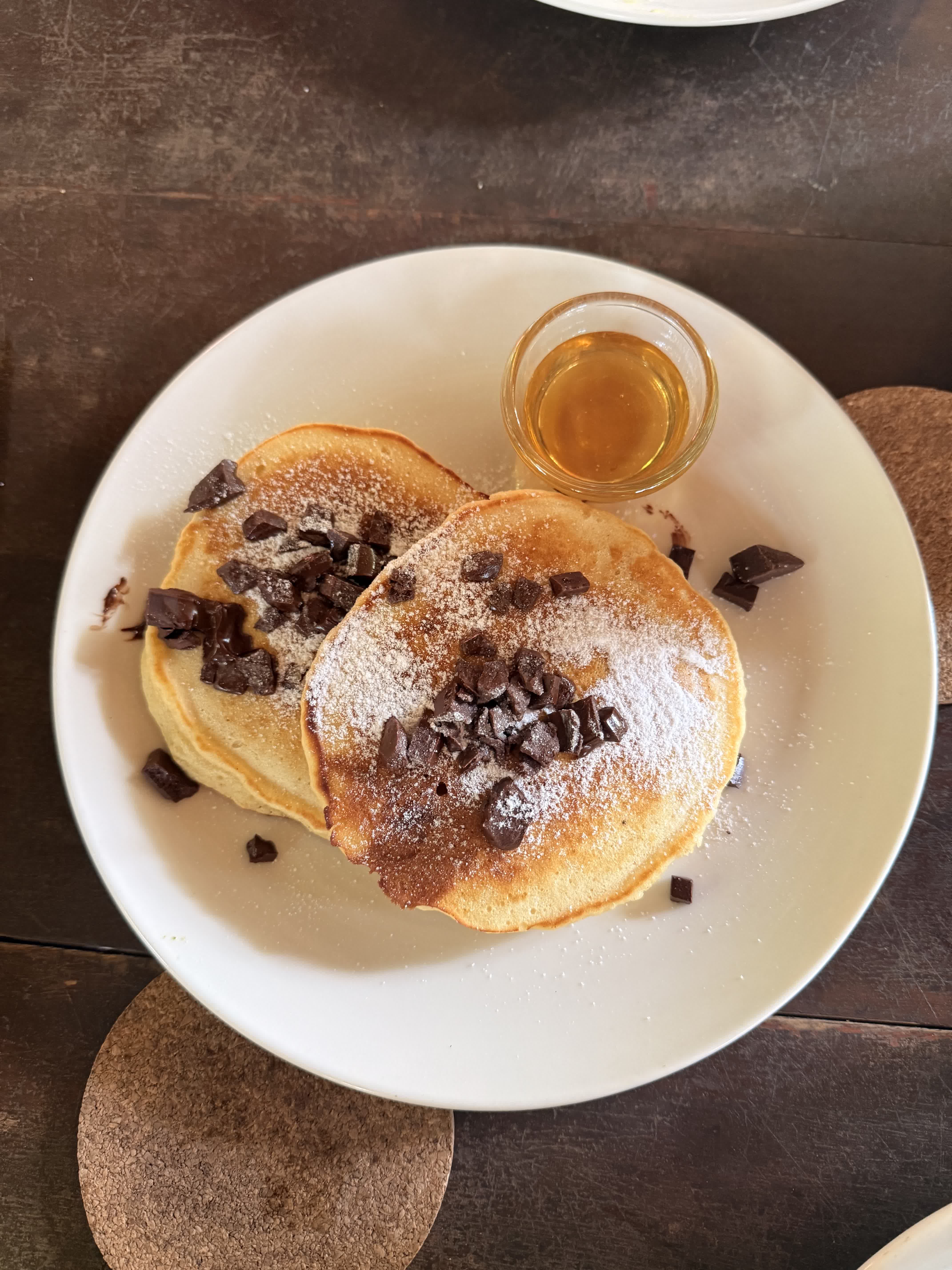 Chocolate chip pancakes with maple syrup