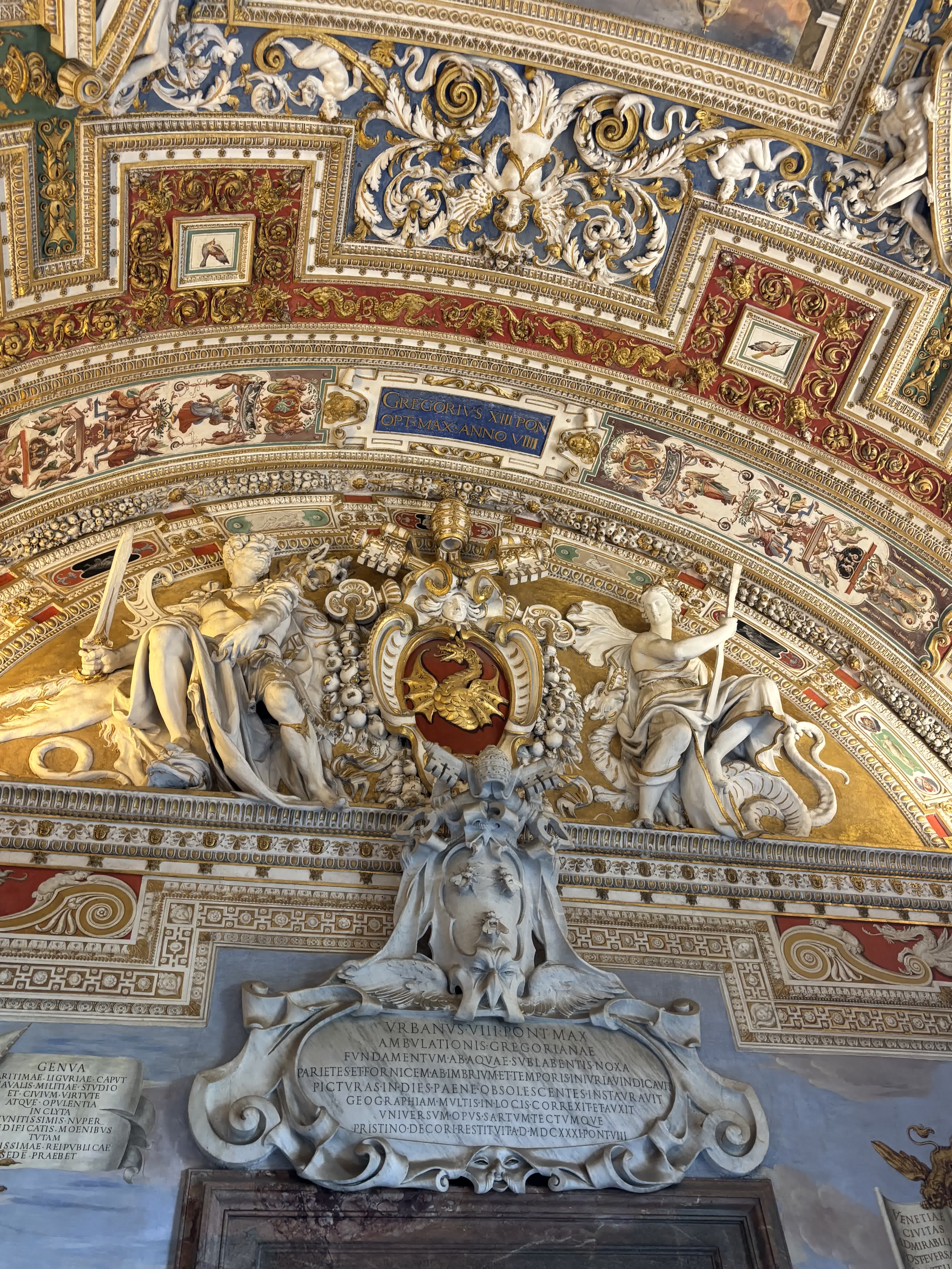 An ornate gilded ceiling inside the Vatican Museums